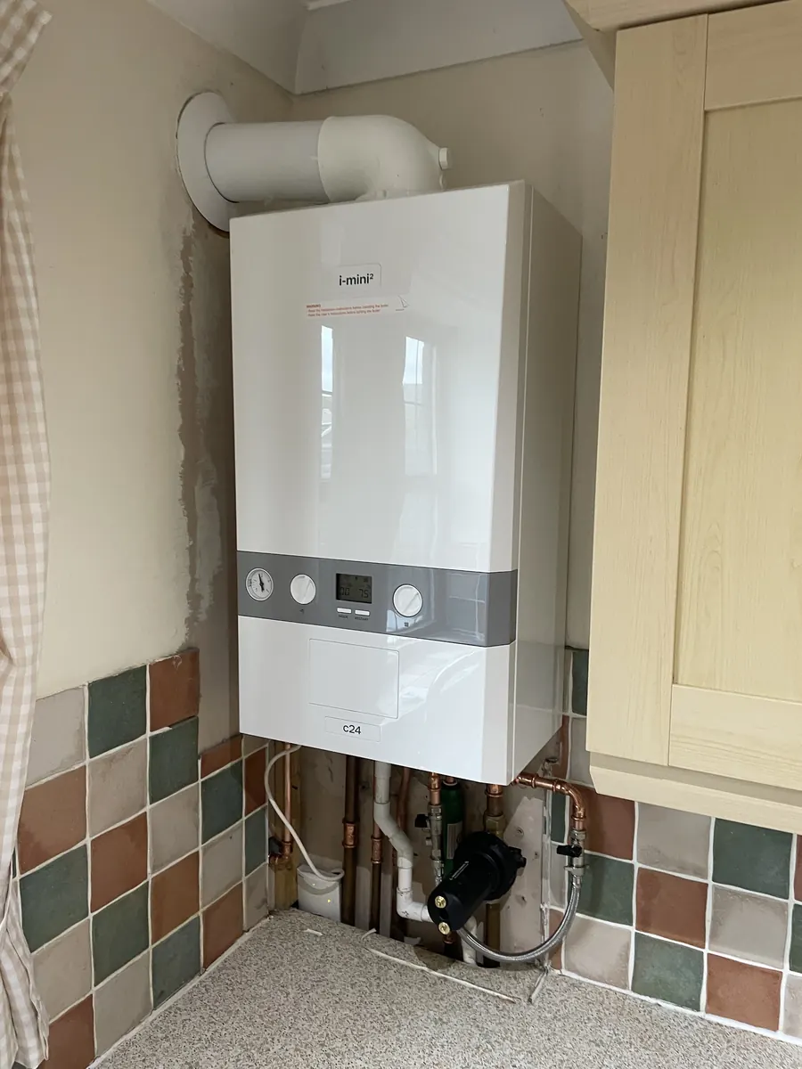 New combi boiler installed in a cottage kitchen